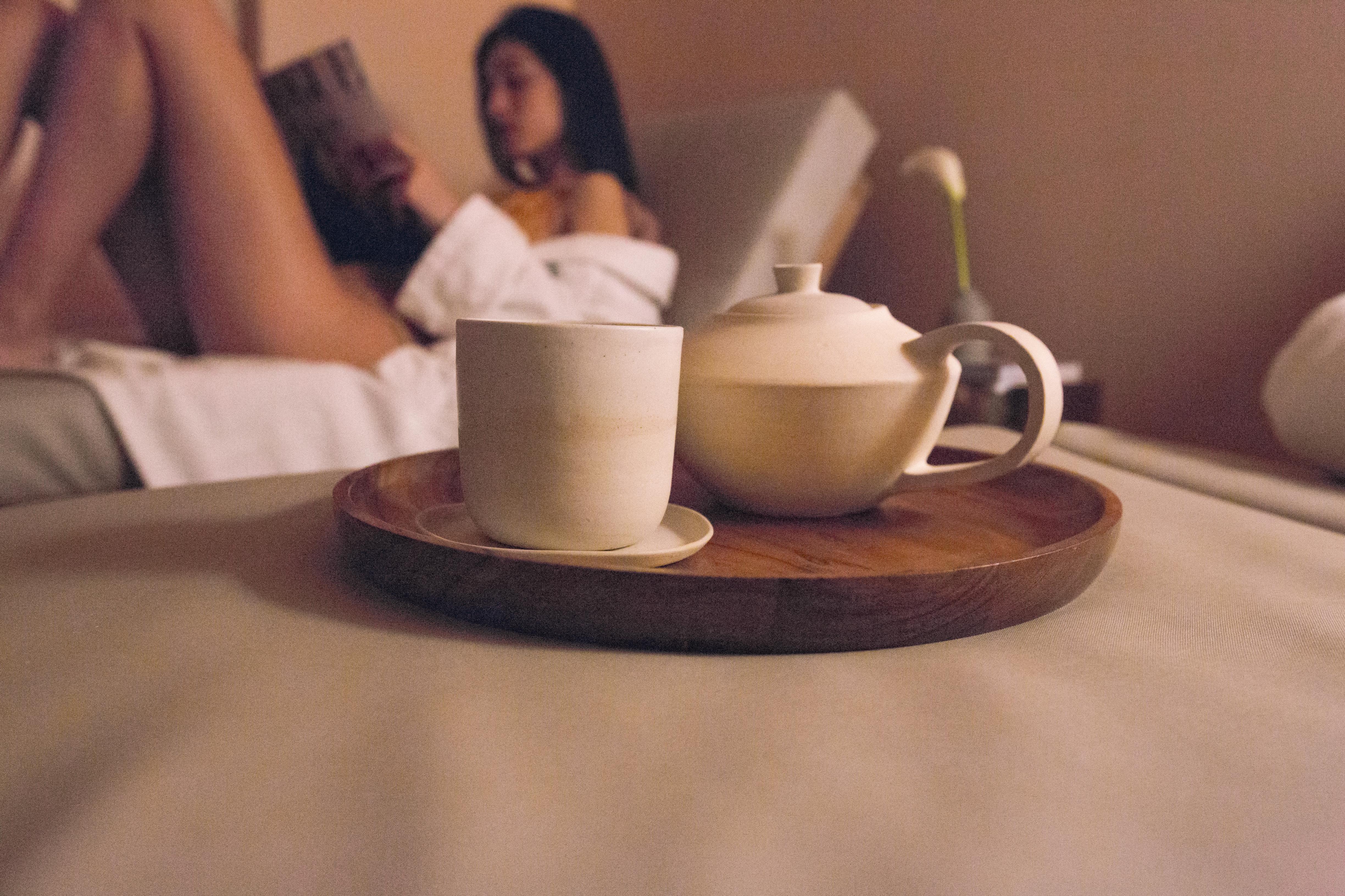 The Vintage Hotel & Spa Lisbon Luaran gambar A woman relaxing with a cup of tea